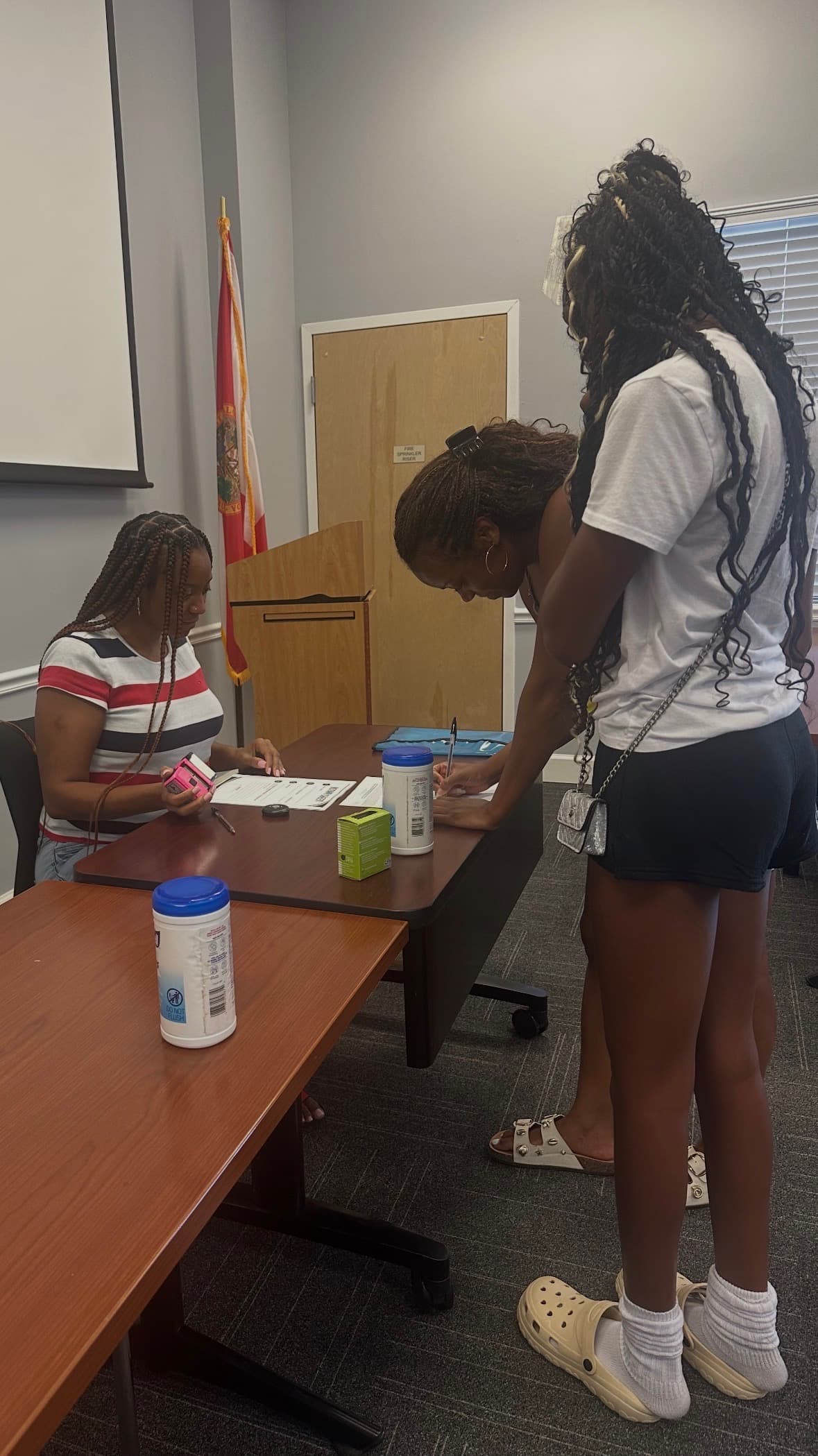 Executive Director notarizing paperwork at the Annual Notary Event in Marianna, Florida